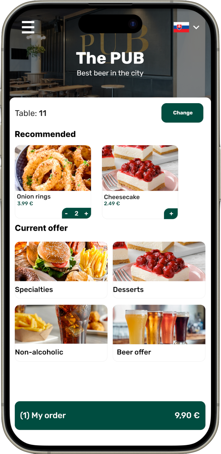 Dini restaurant ordering app interface for The PUB, featuring the slogan 'Best beer in the city.' Displaying table number 11, recommended items like onion rings and cheesecake with prices, and the current offer categories: Specialties, Desserts, Non-alcoholic beverages, and Beer offer. Easy navigation for ordering and payment.